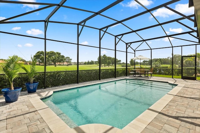 17700 Sawgrass Run, Tavares, FL 32778 - outdoor pool featuring a patio area, glass enclosure, and golf course view