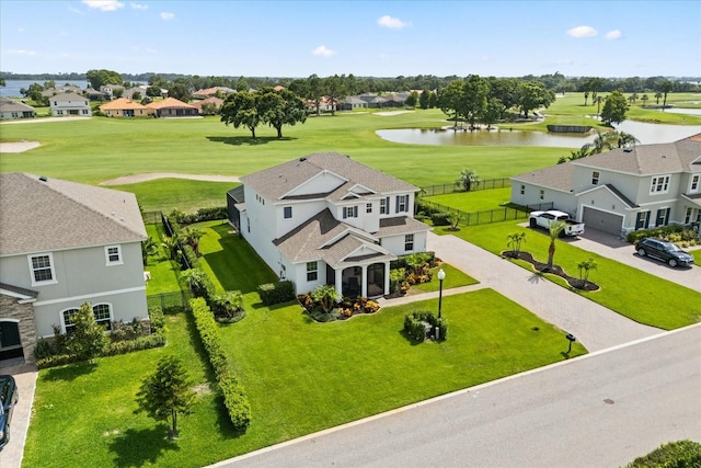 17700 Sawgrass Run, Tavares, FL 32778 - aerial view of residential area featuring a nearby body of water and a golf course