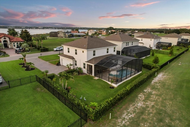 17700 Sawgrass Run, Tavares, FL 32778 - aerial view of residential area featuring a large body of water
