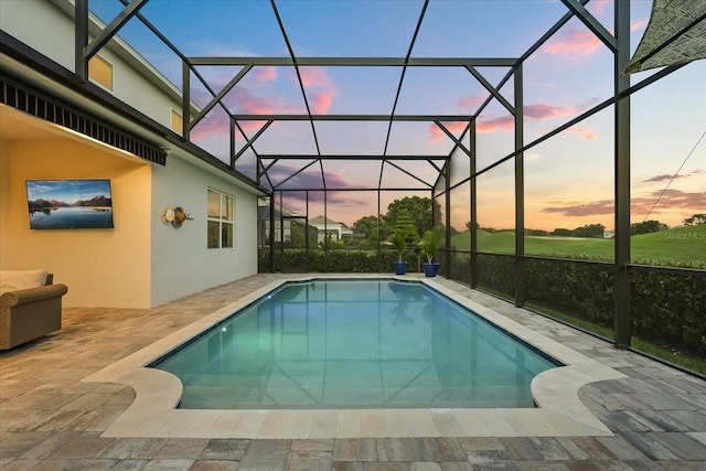 17700 Sawgrass Run, Tavares, FL 32778 - swimming pool featuring a patio area and glass enclosure