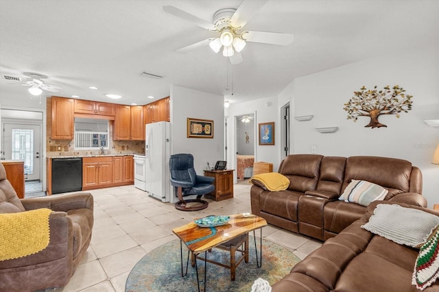 2542 N Regatta Pt, Crystal River, FL 34429 - living area featuring a ceiling fan, light tile patterned floors, and recessed lighting
