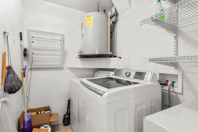 2542 N Regatta Pt, Crystal River, FL 34429 - laundry room featuring water heater and independent washer and dryer