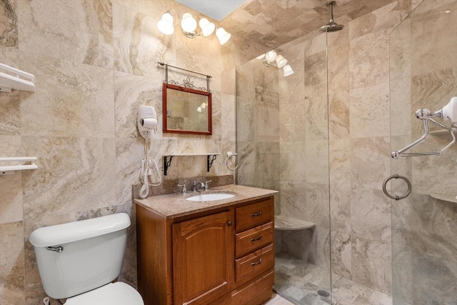 2542 N Regatta Pt, Crystal River, FL 34429 - bathroom with tile walls, tiled shower, vanity, and toilet