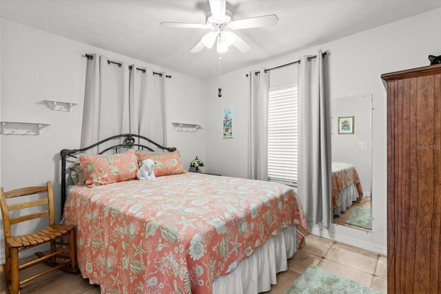 2542 N Regatta Pt, Crystal River, FL 34429 - bedroom featuring light tile patterned floors and a ceiling fan