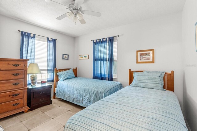 2542 N Regatta Pt, Crystal River, FL 34429 - bedroom featuring a ceiling fan and light tile patterned floors