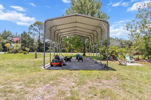 2542 N Regatta Pt, Crystal River, FL 34429 - surrounding community with a lawn, a carport, and driveway
