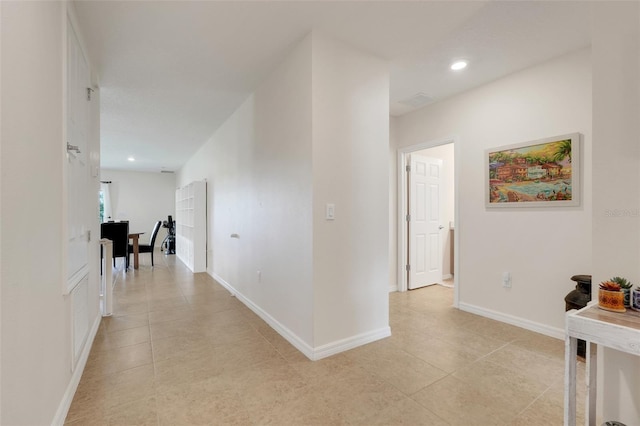 641 Black Eagle Dr, Groveland, FL 34736 - corridor featuring light tile patterned flooring, baseboards, and recessed lighting