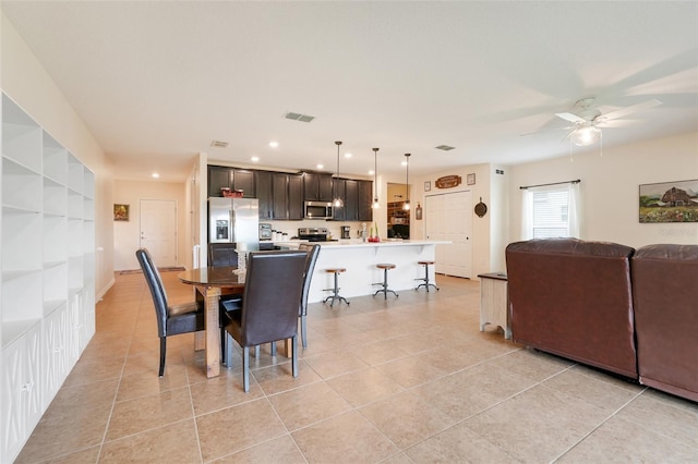 641 Black Eagle Dr, Groveland, FL 34736 - dining area with a ceiling fan, light tile patterned floors, and recessed lighting