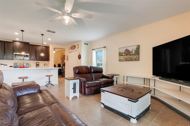 641 Black Eagle Dr, Groveland, FL 34736 - living room with ceiling fan, light tile patterned floors, and recessed lighting