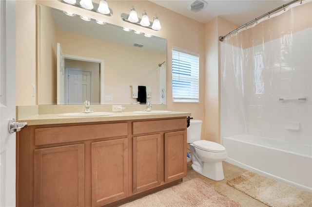641 Black Eagle Dr, Groveland, FL 34736 - full bath with toilet, double vanity, tile patterned flooring, and shower / tub combo