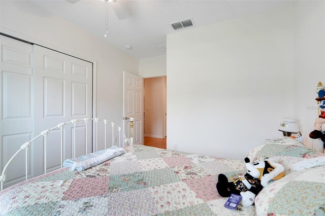 641 Black Eagle Dr, Groveland, FL 34736 - unfurnished bedroom with a closet and a ceiling fan