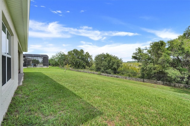 641 Black Eagle Dr, Groveland, FL 34736 - view of green lawn with glass enclosure