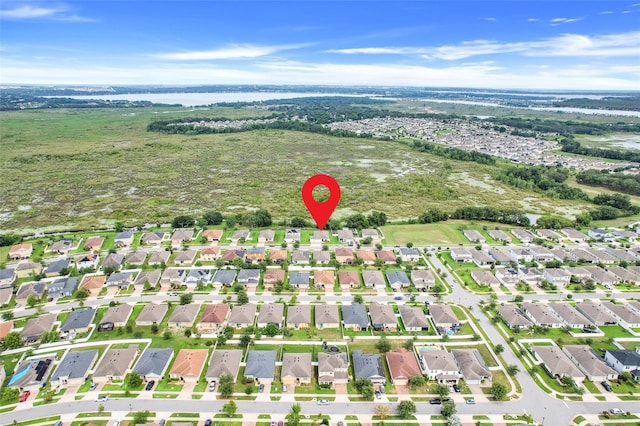 641 Black Eagle Dr, Groveland, FL 34736 - aerial overview of property's location featuring a nearby body of water and nearby suburban area