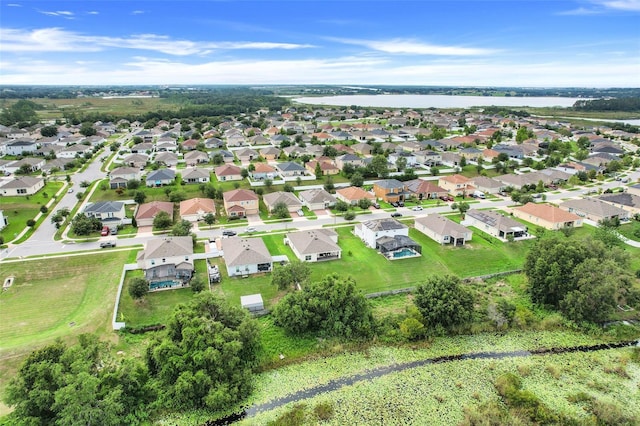 641 Black Eagle Dr, Groveland, FL 34736 - aerial overview of property's location with a nearby body of water and nearby suburban area