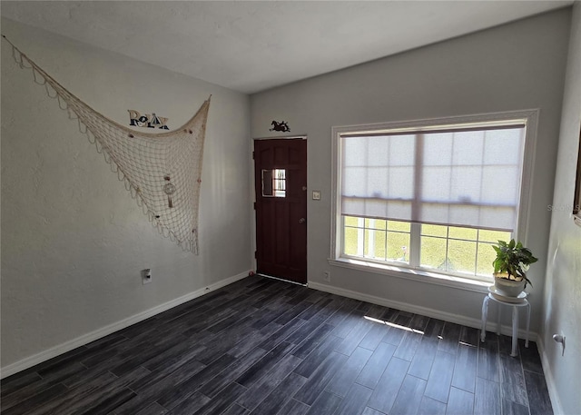 504 SE 35th Ave, Ocala, FL 34471 - foyer entrance featuring dark wood-style floors and baseboards