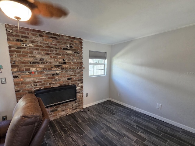 504 SE 35th Ave, Ocala, FL 34471 - unfurnished living room featuring baseboards, a fireplace, dark wood finished floors, and crown molding