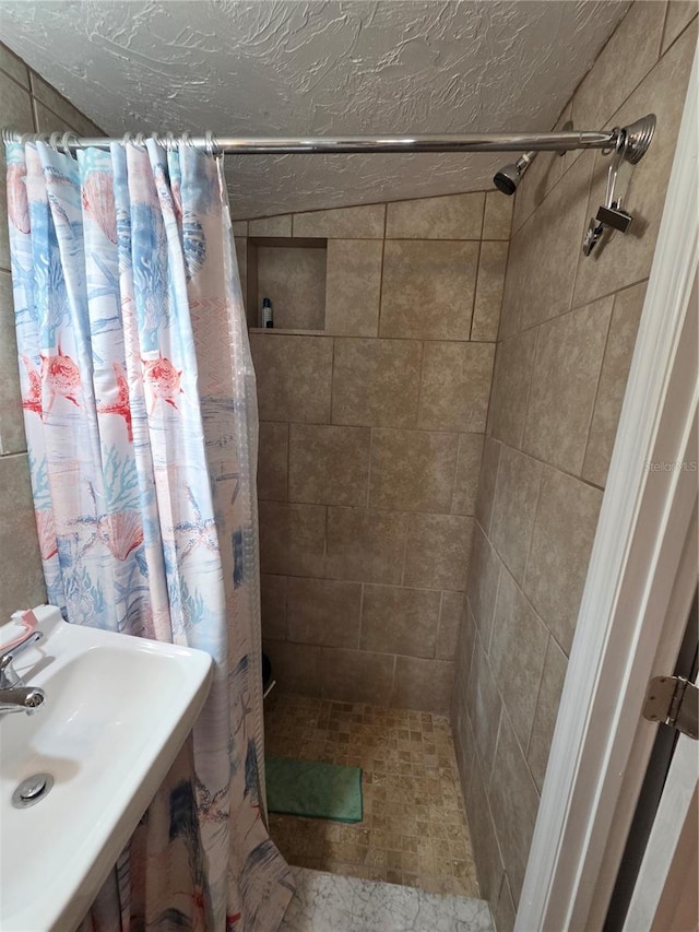 504 SE 35th Ave, Ocala, FL 34471 - bathroom with a tile shower and a sink