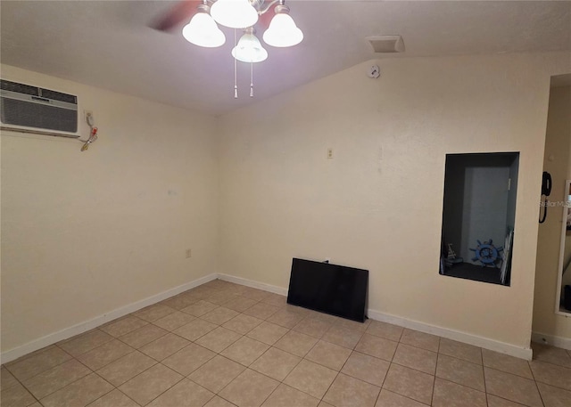 504 SE 35th Ave, Ocala, FL 34471 - empty room with lofted ceiling, light tile patterned flooring, an AC wall unit, and a ceiling fan