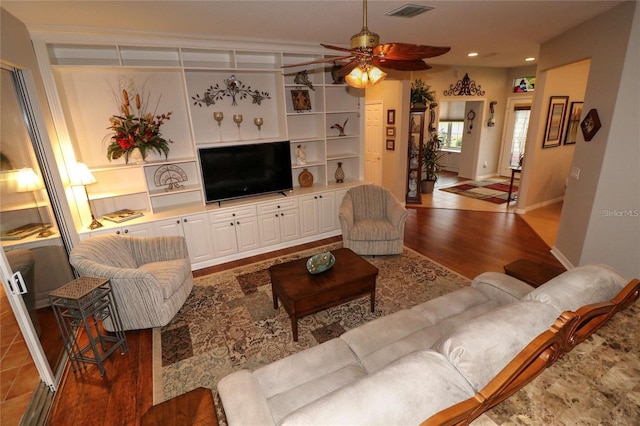 11868 SE 91st Cir, Summerfield, FL 34491 - living area with a ceiling fan, recessed lighting, wood finished floors, and baseboards