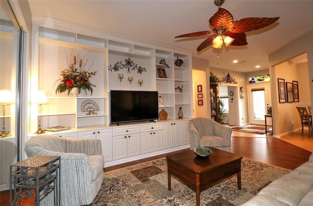 11868 SE 91st Cir, Summerfield, FL 34491 - living room with dark wood-style flooring, ceiling fan, recessed lighting, built in features, and baseboards