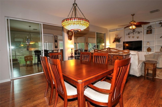 11868 SE 91st Cir, Summerfield, FL 34491 - dining area featuring ceiling fan and wood finished floors