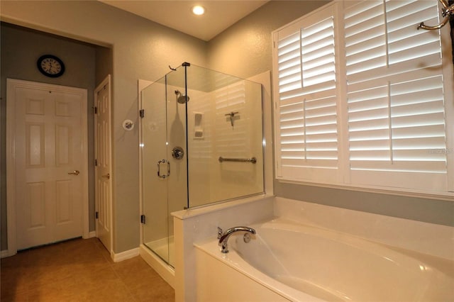 11868 SE 91st Cir, Summerfield, FL 34491 - bathroom featuring a bath, a stall shower, tile patterned floors, and recessed lighting