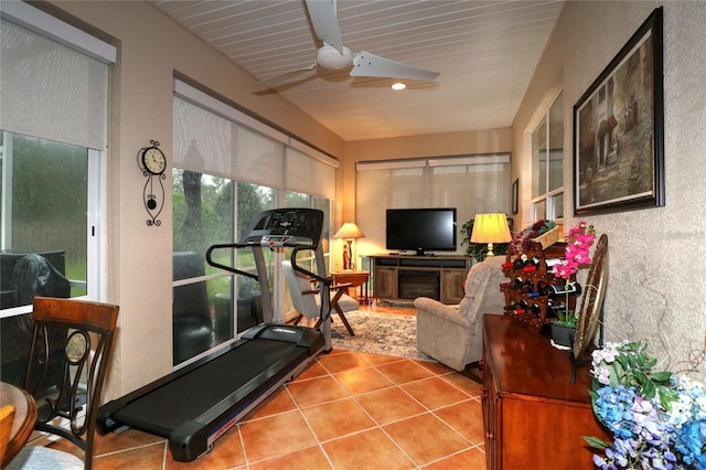 11868 SE 91st Cir, Summerfield, FL 34491 - exercise room featuring a ceiling fan and tile patterned floors