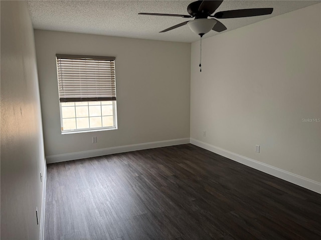 2450 Sweetwater Country Club Dr, Apopka, FL 32712 - unfurnished room featuring a ceiling fan, dark wood-style flooring, baseboards, and a textured ceiling