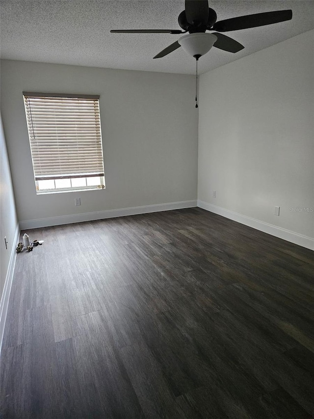 2450 Sweetwater Country Club Dr, Apopka, FL 32712 - unfurnished room with ceiling fan, wood finished floors, baseboards, and a textured ceiling