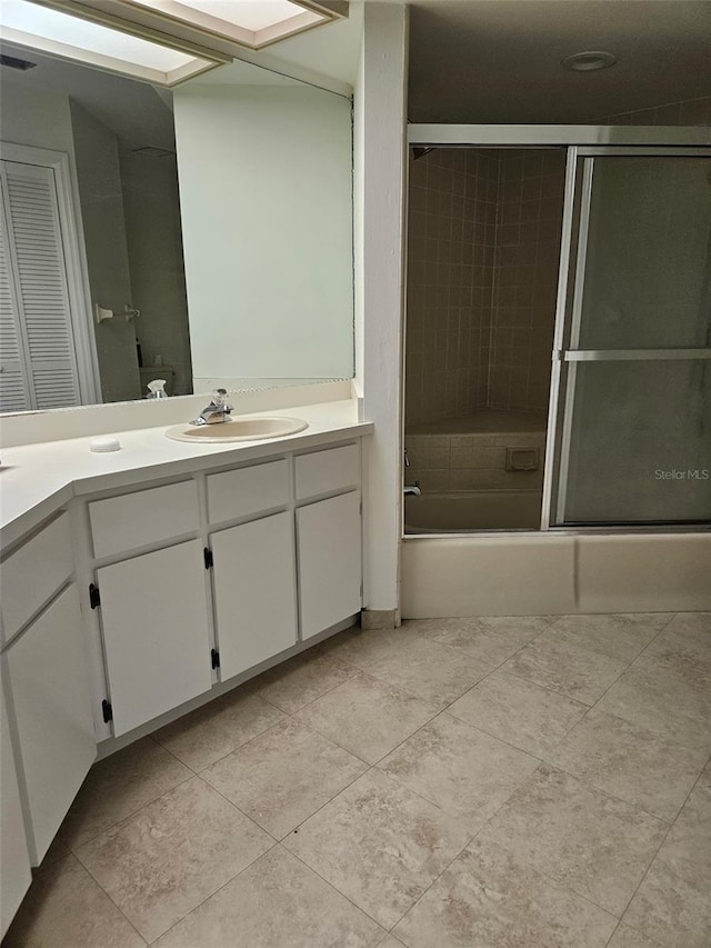 2450 Sweetwater Country Club Dr, Apopka, FL 32712 - bathroom featuring vanity, enclosed tub / shower combo, and tile patterned flooring