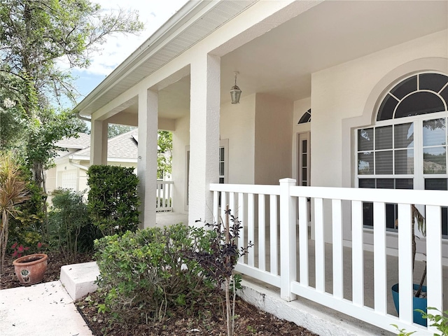 3555 Chapel Hill Blvd, Clermont, FL 34711 - entrance to property with stucco siding and covered porch