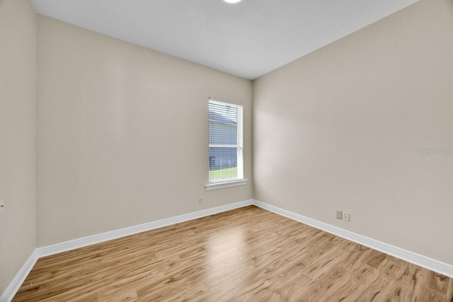 5556 Vintage View Blvd, Lakeland, FL 33812 - unfurnished room with light wood finished floors and baseboards