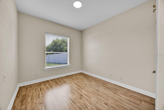 5556 Vintage View Blvd, Lakeland, FL 33812 - unfurnished room featuring light wood-style flooring and baseboards