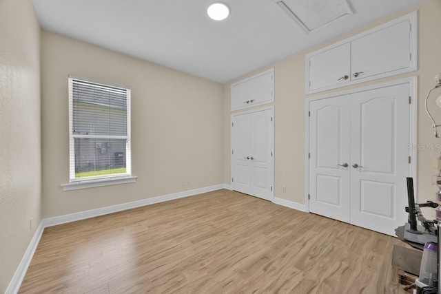 5556 Vintage View Blvd, Lakeland, FL 33812 - unfurnished bedroom with light wood-style flooring and baseboards