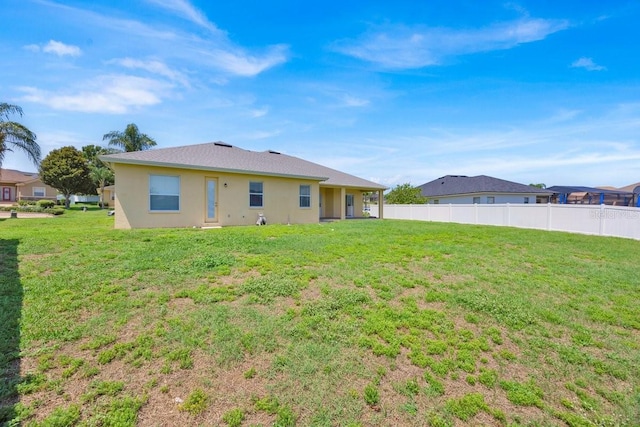 5556 Vintage View Blvd, Lakeland, FL 33812 - back of property featuring stucco siding