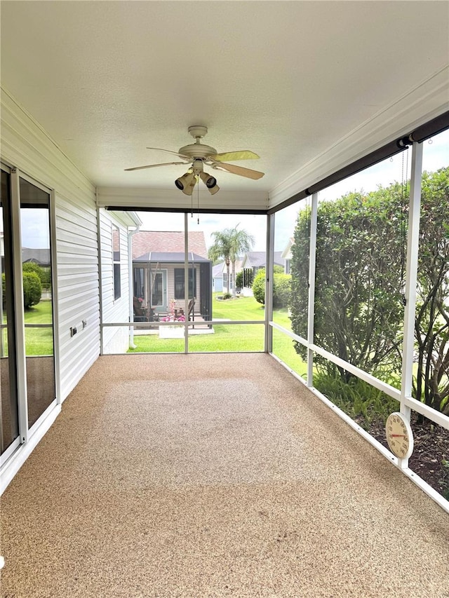 2530 Hanlon Ter, The Villages, FL 32162 - unfurnished sunroom featuring ceiling fan and plenty of natural light