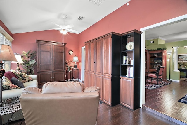 215 Chula Vista Ave, The Villages, FL 32159 - living area featuring dark wood-style flooring, a ceiling fan, decorative columns, lofted ceiling, and baseboards