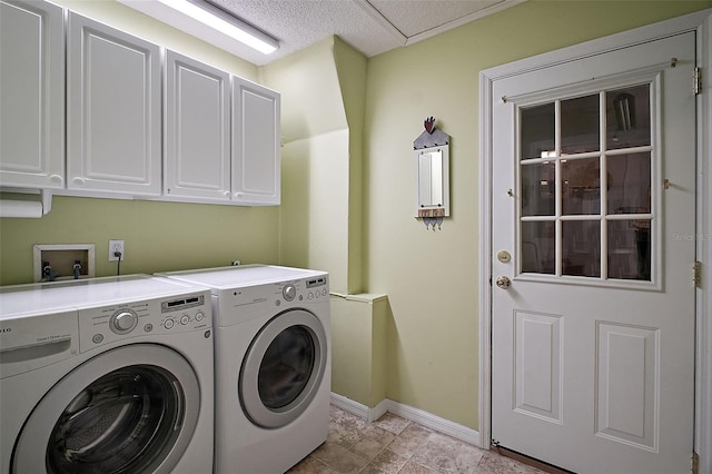 215 Chula Vista Ave, The Villages, FL 32159 - laundry room featuring cabinet space, separate washer and dryer, and baseboards