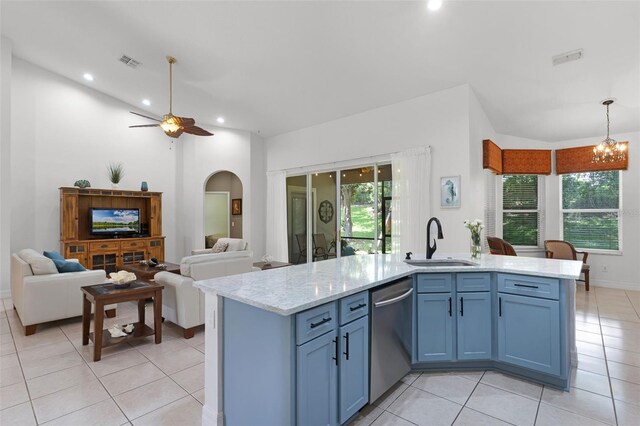 4239 Fawn Meadows Cir, Clermont, FL 34711 - kitchen featuring dishwasher, a sink, open floor plan, light tile patterned flooring, and plenty of natural light