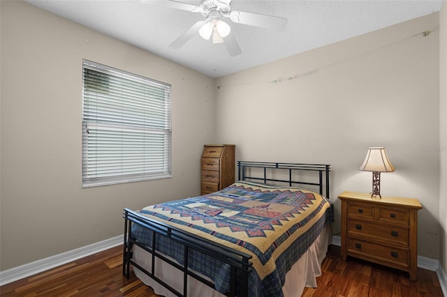 4239 Fawn Meadows Cir, Clermont, FL 34711 - bedroom with baseboards, wood finished floors, and ceiling fan