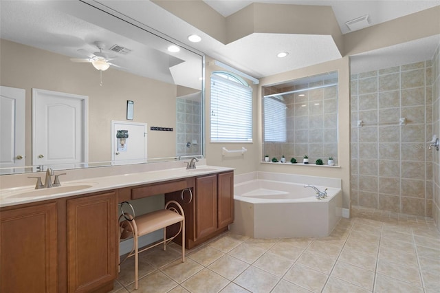 4239 Fawn Meadows Cir, Clermont, FL 34711 - bathroom featuring a bath, double vanity, ceiling fan, tile patterned flooring, and tiled shower
