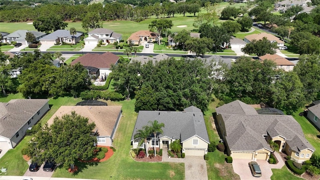 4239 Fawn Meadows Cir, Clermont, FL 34711 - aerial perspective of suburban area with a local golf course