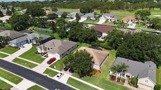 4239 Fawn Meadows Cir, Clermont, FL 34711 - aerial view of property and surrounding area with nearby suburban area and a golf club