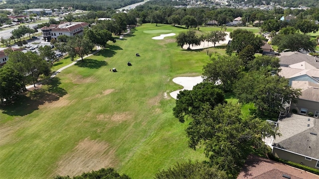 4239 Fawn Meadows Cir, Clermont, FL 34711 - aerial view of property's location with a local golf course and nearby suburban area