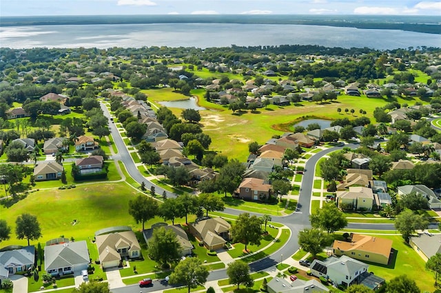 4239 Fawn Meadows Cir, Clermont, FL 34711 - aerial perspective of suburban area featuring a large body of water and a golf course