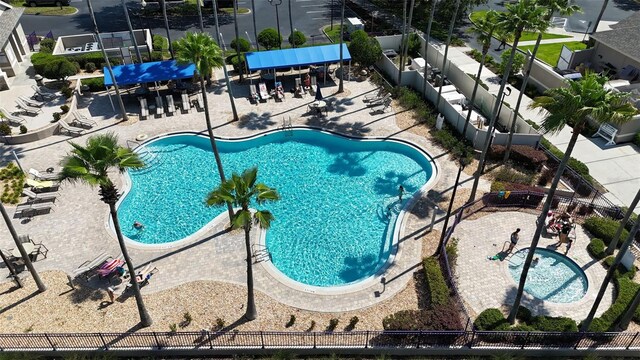 4239 Fawn Meadows Cir, Clermont, FL 34711 - community pool featuring a patio