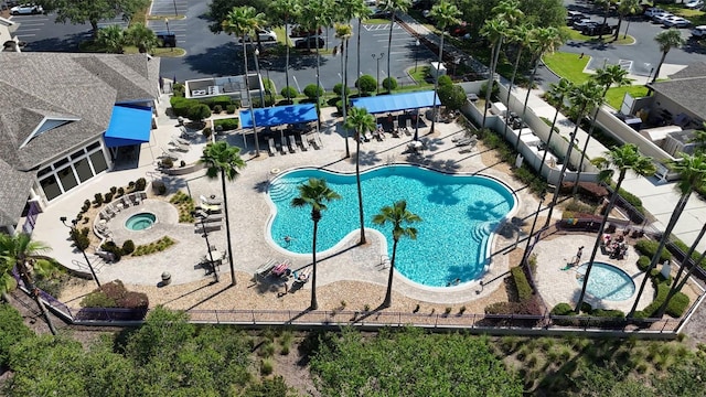 4239 Fawn Meadows Cir, Clermont, FL 34711 - community pool featuring a patio