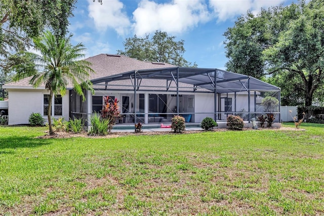 34231 Shadewood Cir, Leesburg, FL 34788 - rear view of house featuring a lanai and a shingled roof