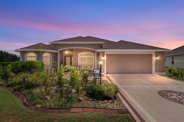 3097 Bureau Path, The Villages, FL 32163 - single story home with stucco siding, an attached garage, concrete driveway, and roof with shingles