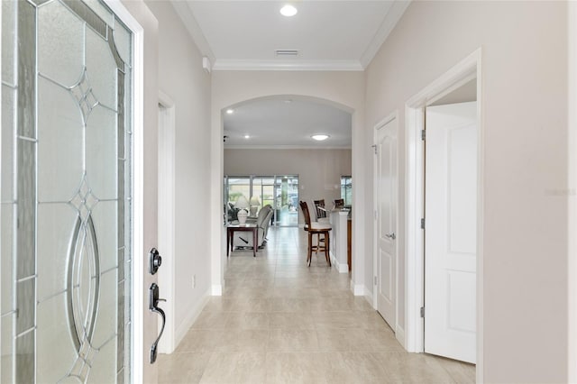3097 Bureau Path, The Villages, FL 32163 - entrance foyer with arched walkways, ornamental molding, baseboards, recessed lighting, and light tile patterned floors